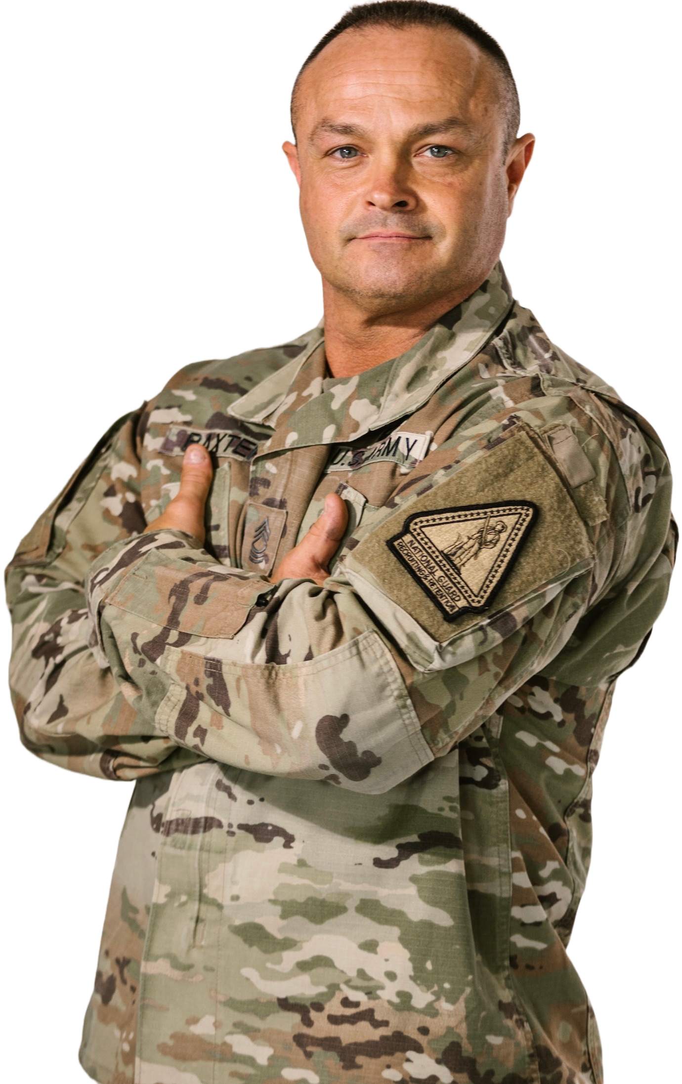 Picture of a smiling veteran with arms crossed over his chest.